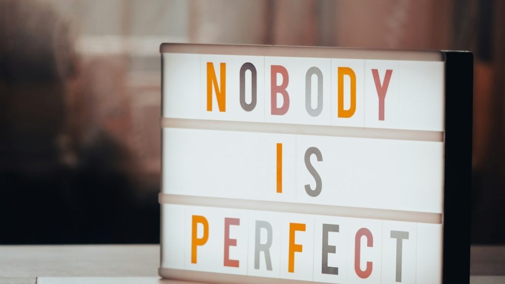 a light box that says nobody is perfect